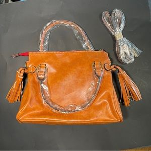 Brown genuine leather satchel purse tassels zip closure pockets, crossbody strap